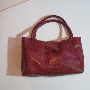 Red clutch bag, pvc yet looks like leather